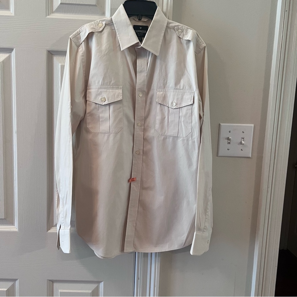 Express men’s medium cream long sleeve button down shirt with pockets.